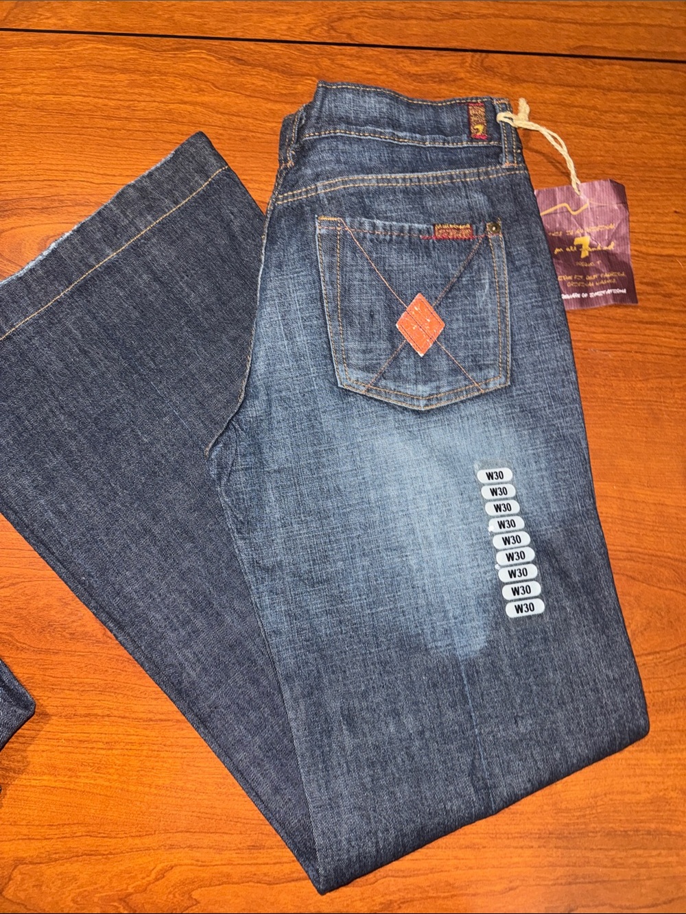 7 For All Mankind Bootcut Jeans in Medium Blue Wash